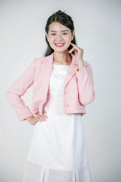 Veste courte en rose pâle