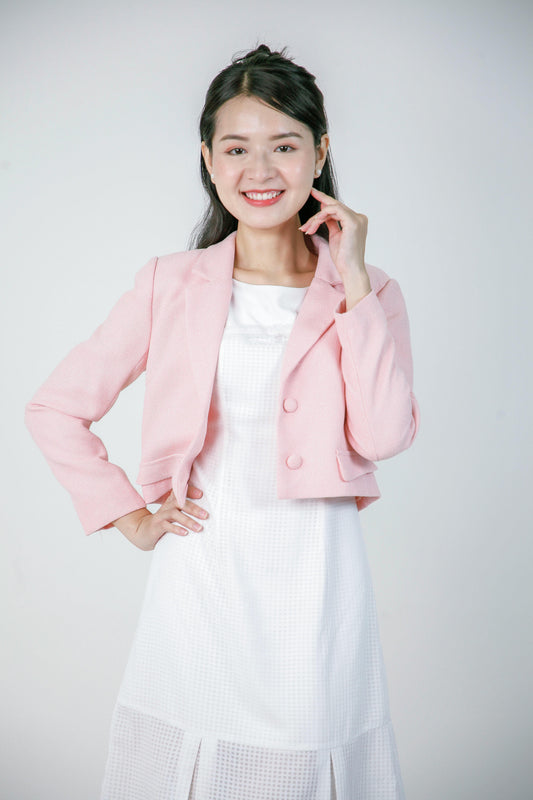 Veste courte en rose pâle