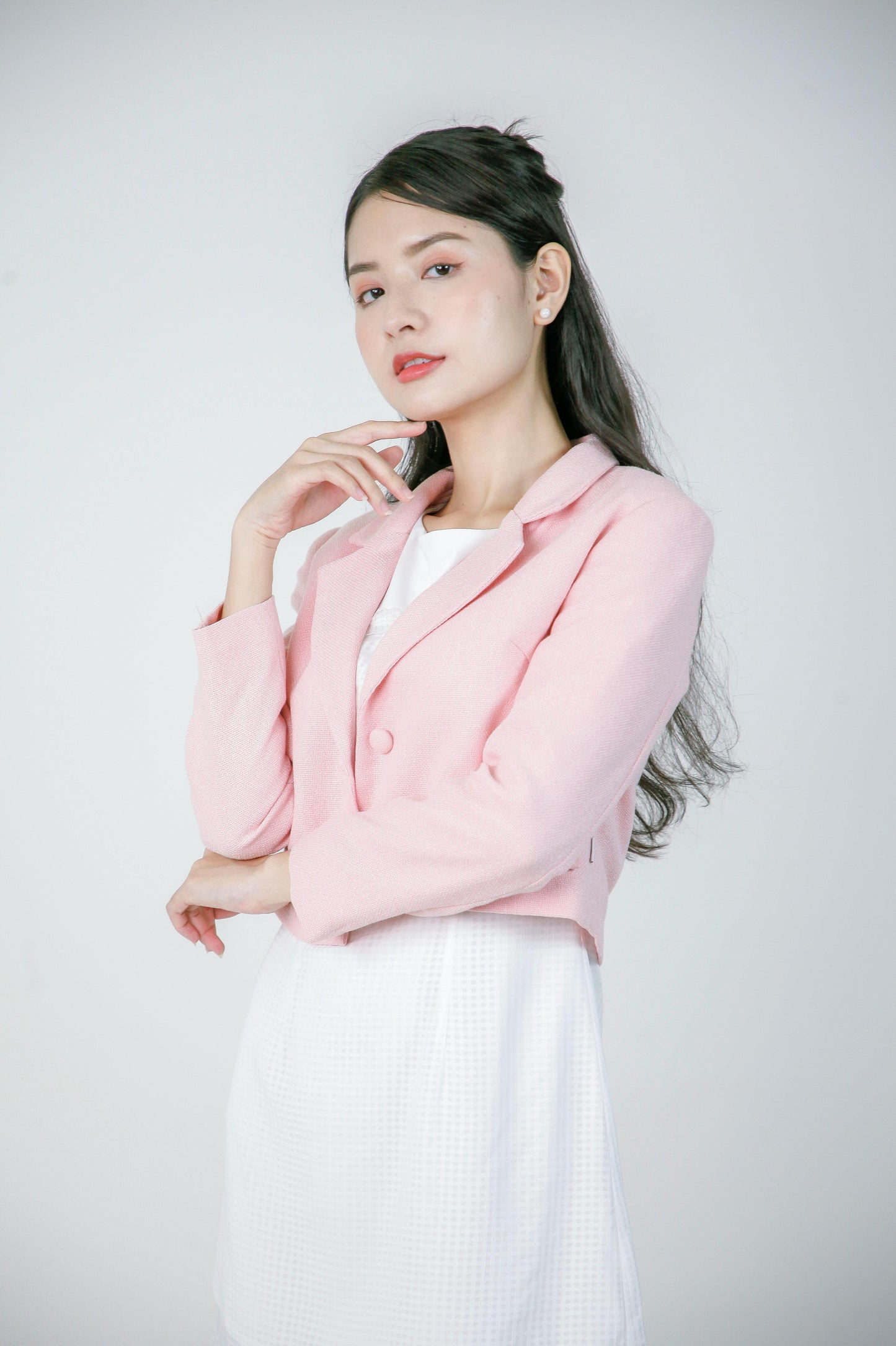 Veste courte en rose pâle