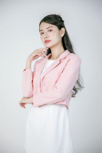 Veste courte en rose pâle